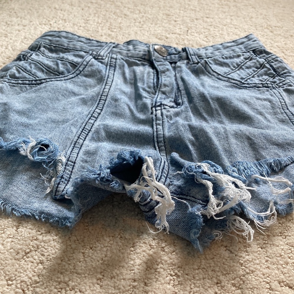 Size: women’s 30, brand: unknown, color: acid wash.